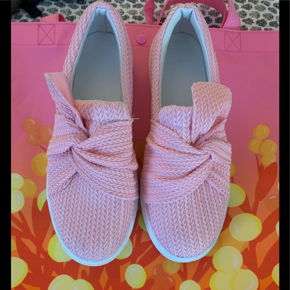 Pink slip on sneakers